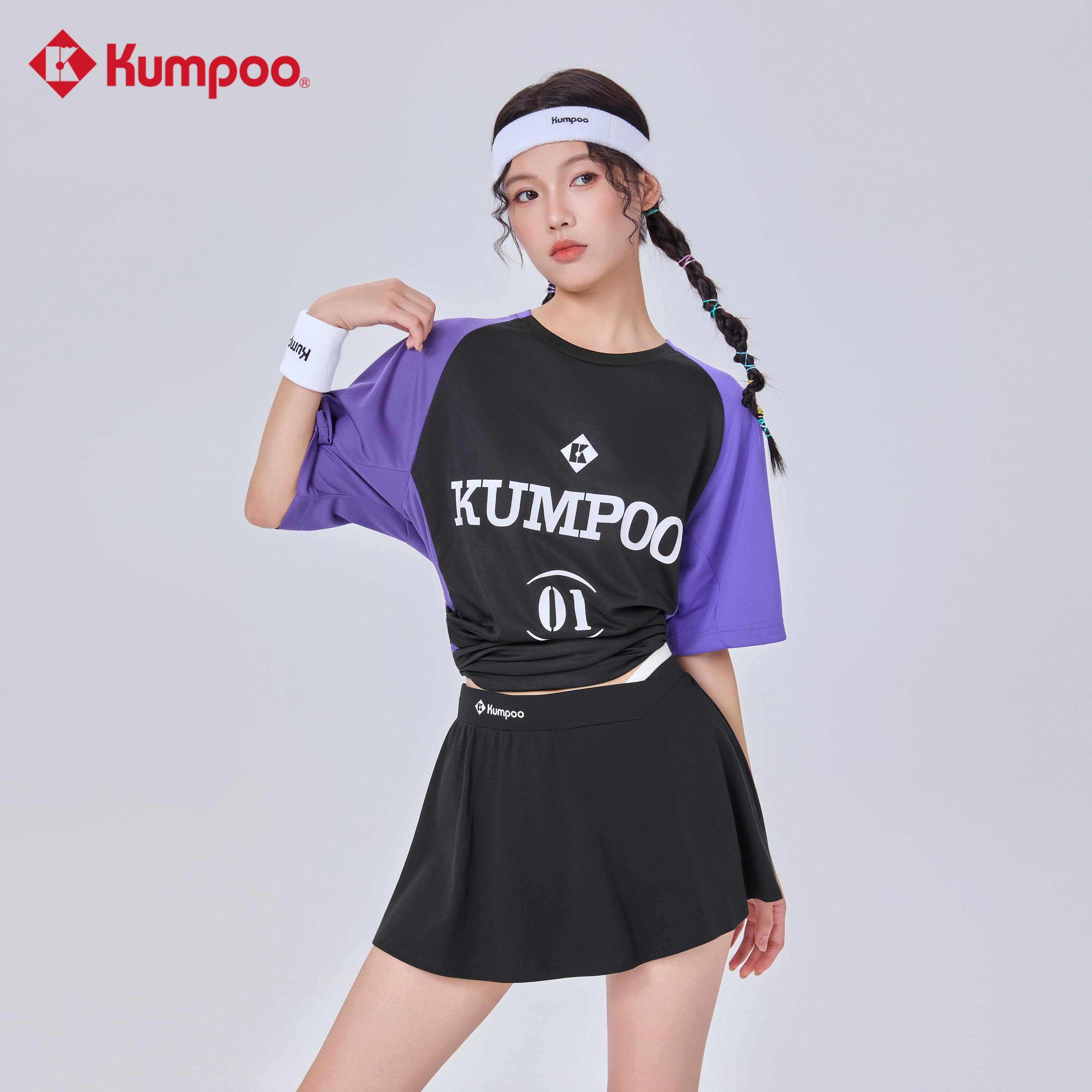 Kumpoo K261W-7181 women's skirt featuring a stylish, knee-length design with a comfortable fit and modern fabric.