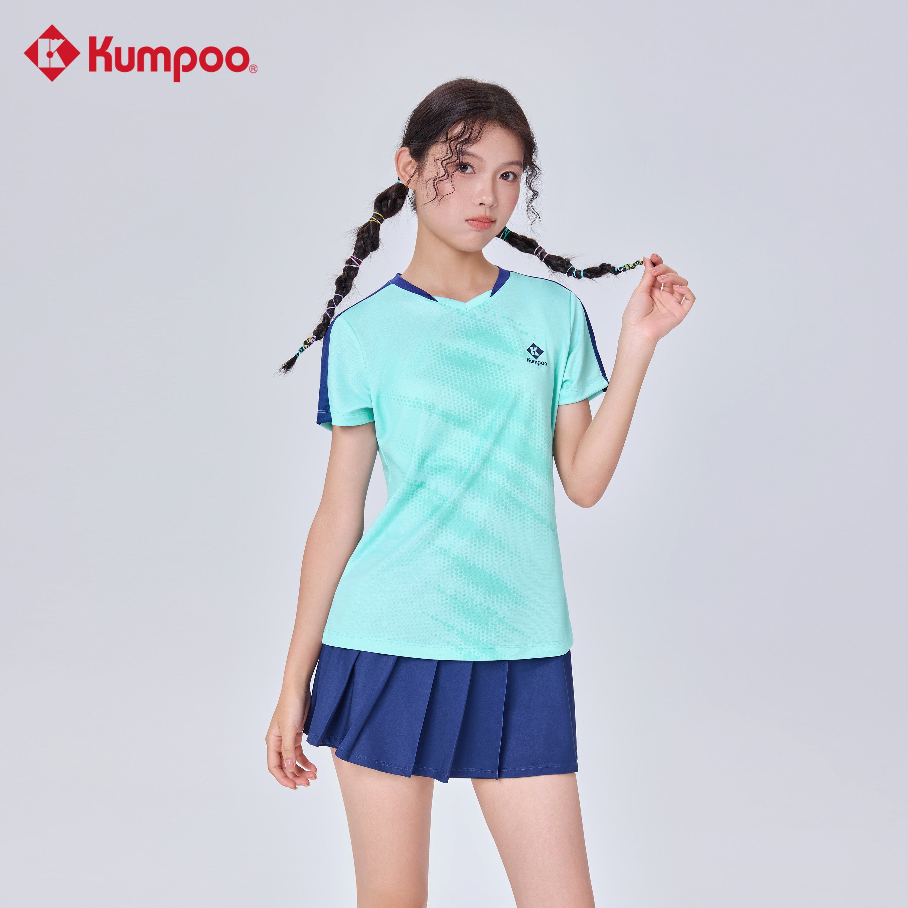 Kumpoo women's T-shirt in soft fabric, featuring a round neckline and short sleeves, displayed on a plain background.