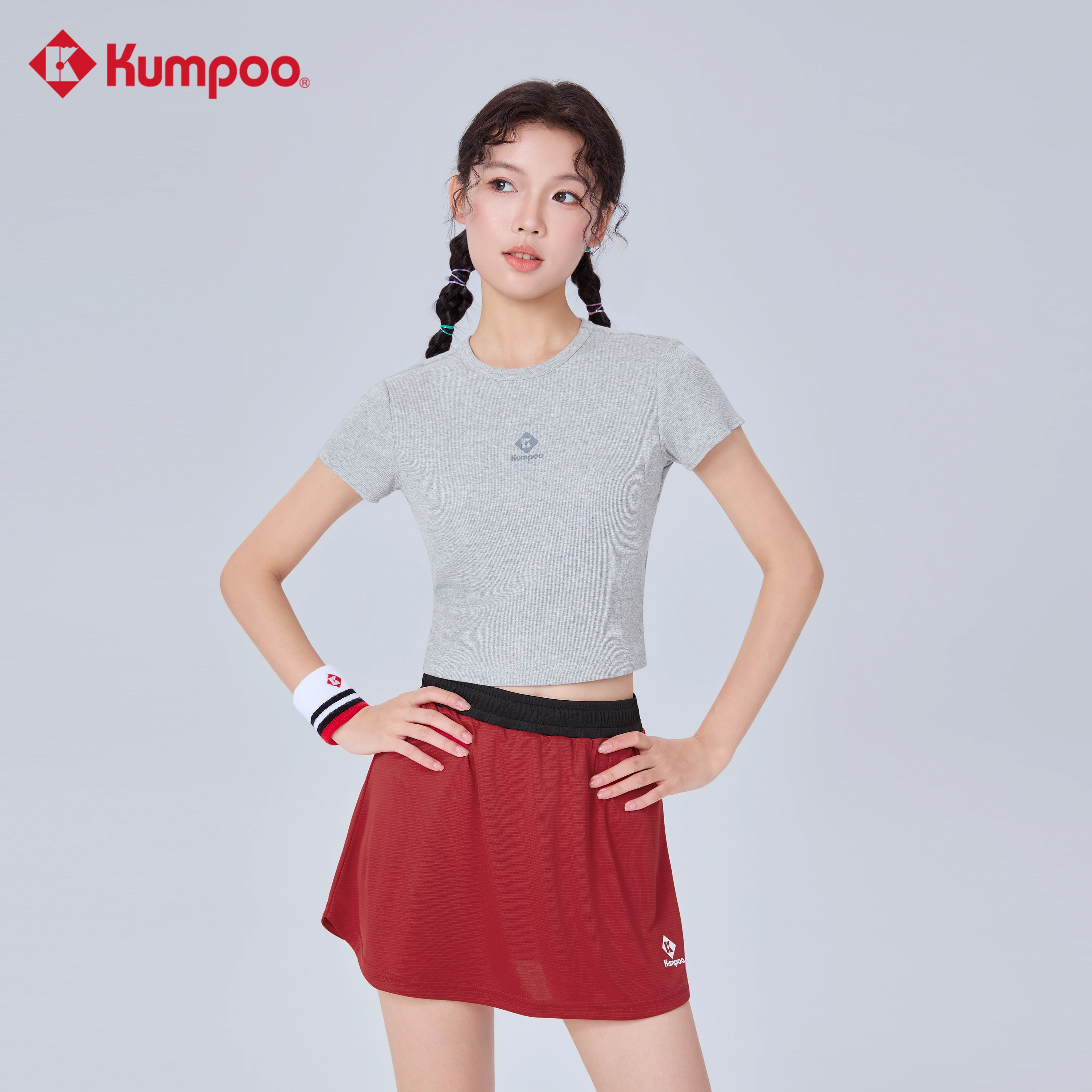 Kumpoo K261W-1140 women's T-shirt in soft fabric, featuring a casual fit and short sleeves, ideal for everyday wear.